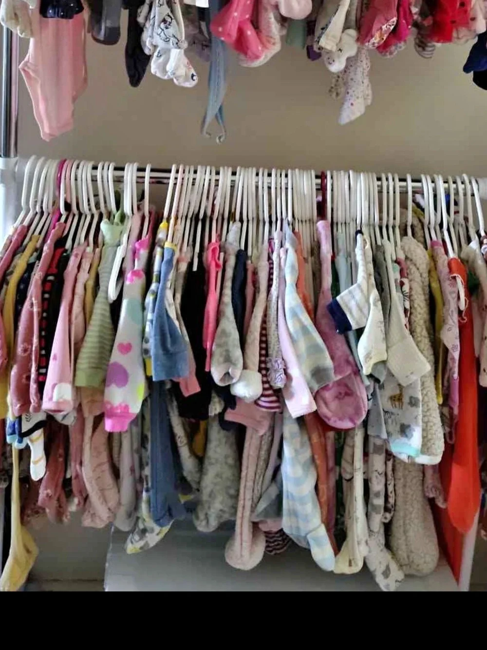 Tote of baby girls clothing